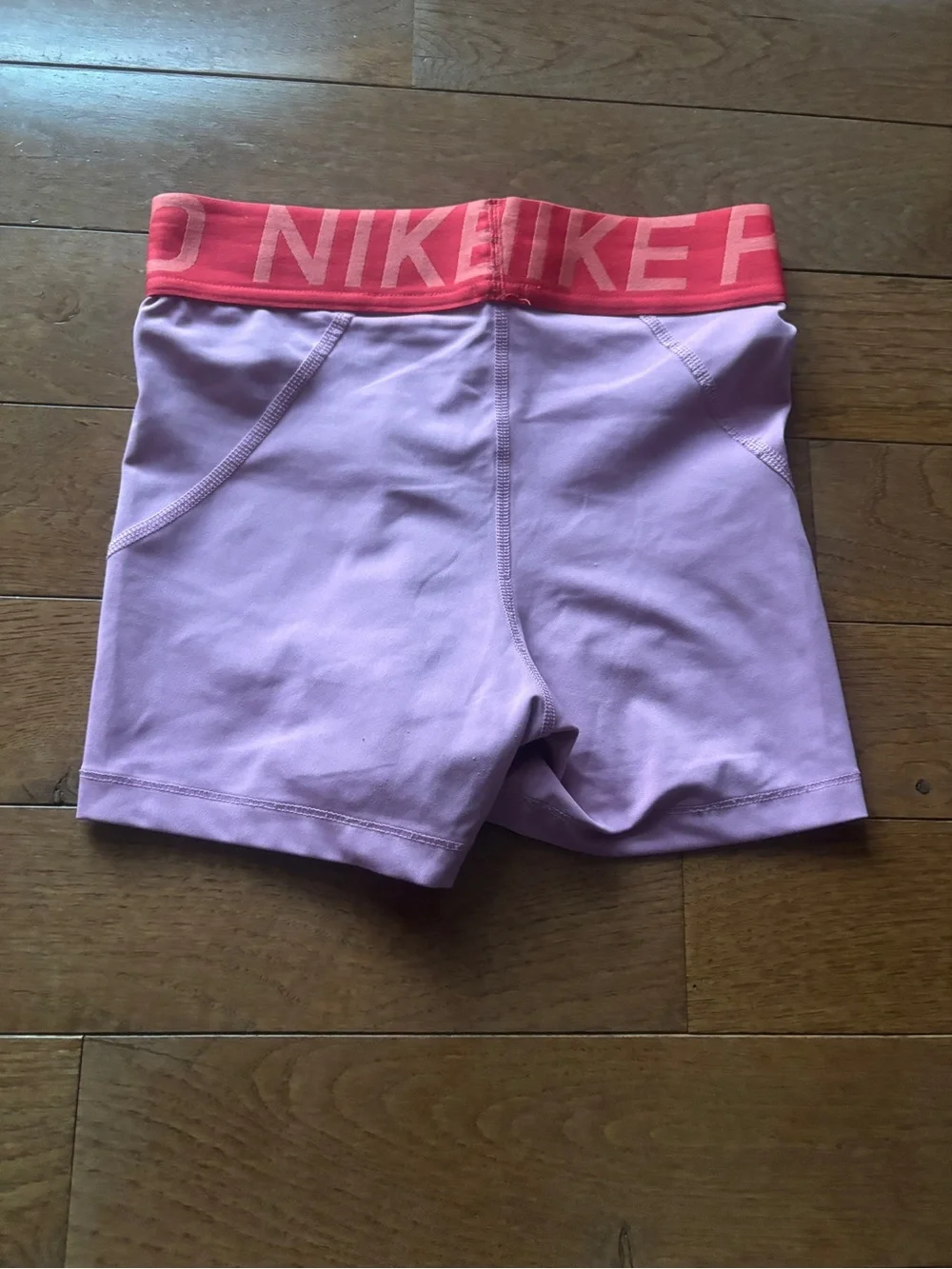 Nike Pro Women’s Pink Training Shorts with Coral Branded Waistband